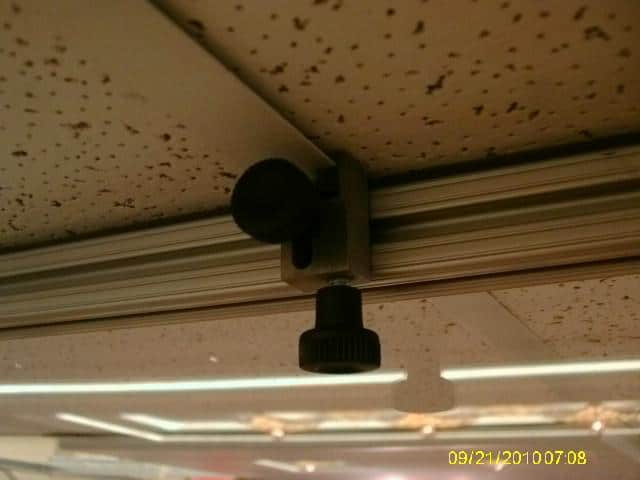 Custom locking component to mount to drop ceiling members for quick attachments